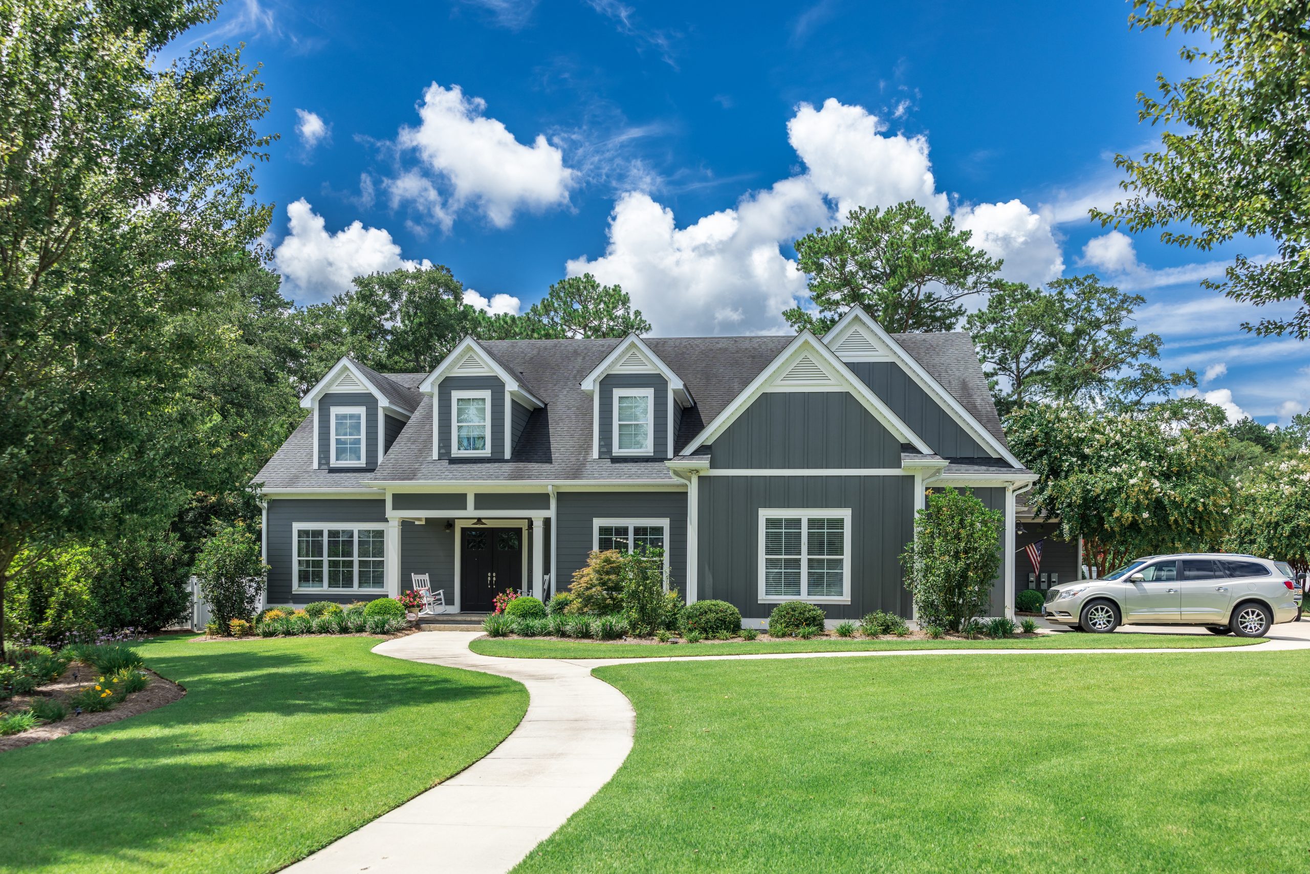 Beautiful home with Hardie Plank siding installed, showcasing durable and weather-resistant exterior in Greater Houston.